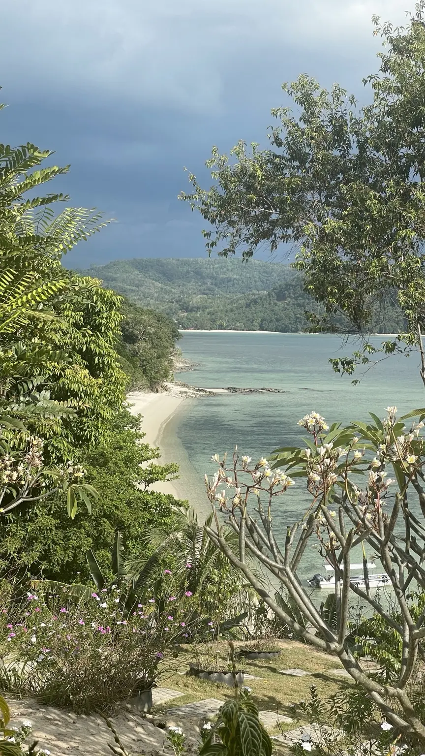 A secluded tropical bay at Bigfin Beach Resort in Sabah, Borneo