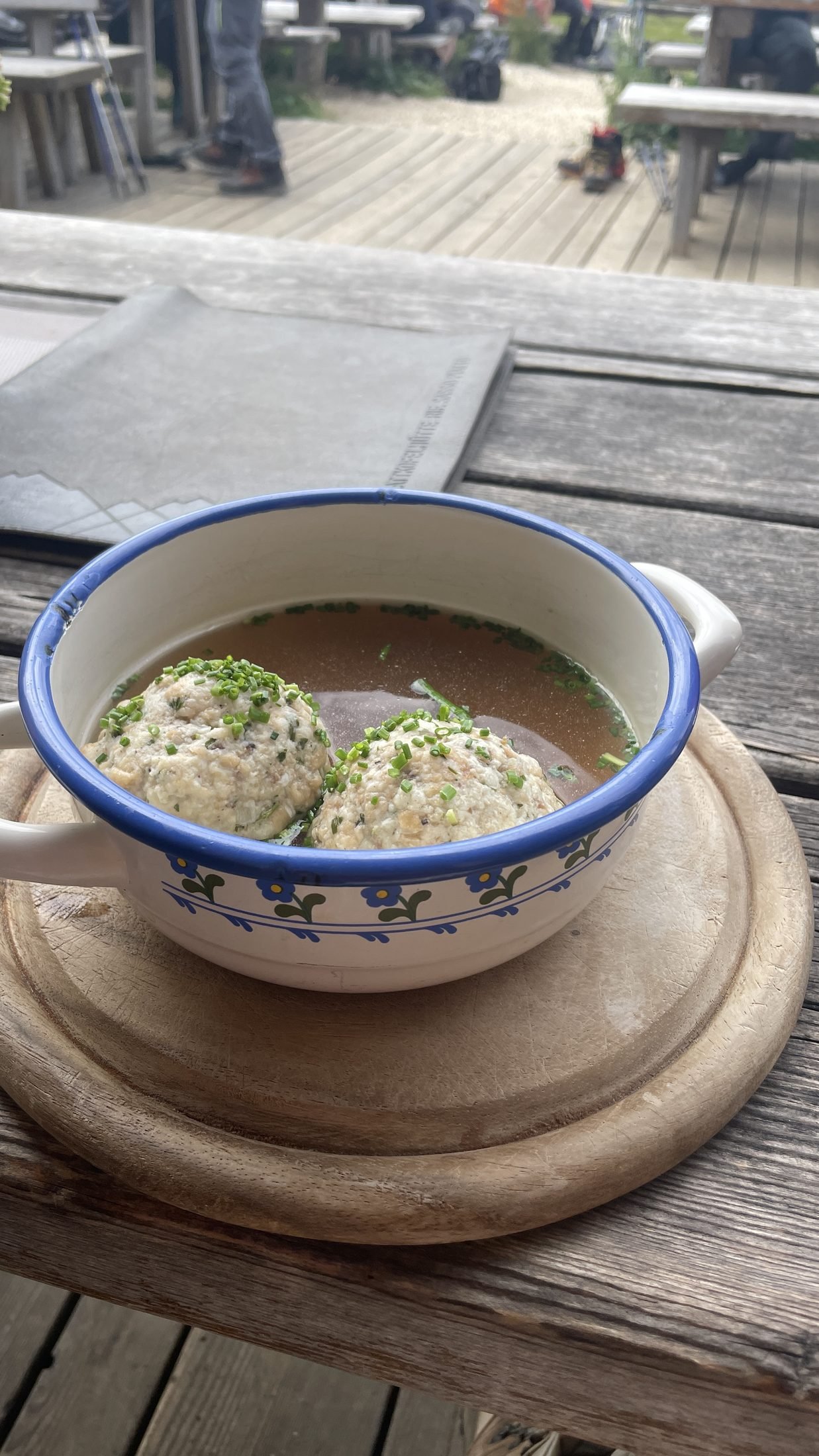 Two South Tyrolean dumplings in broth during the hut-to-hut hike