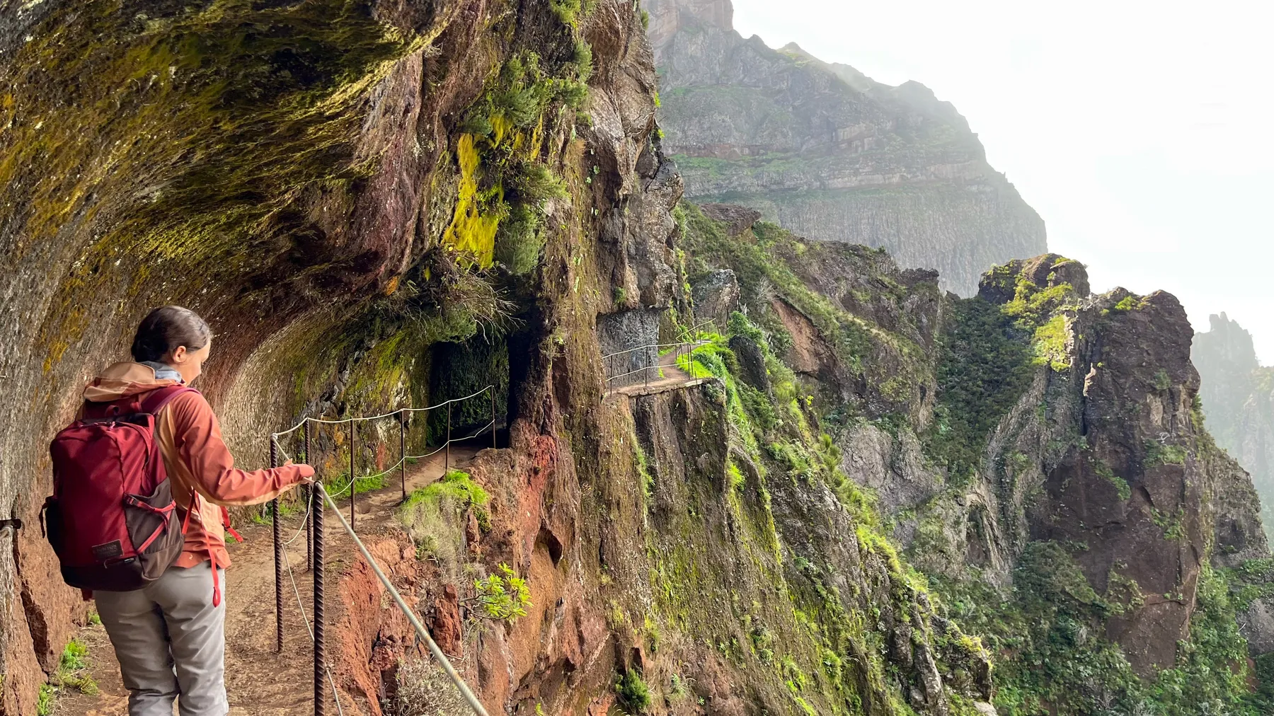 Mountain hiking trail above the clouds in Madeira